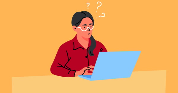 Confused woman working on laptop